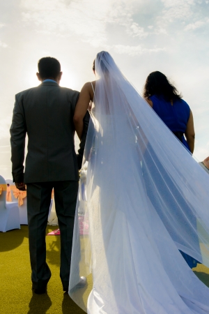 From the back of the bride  That went into the wedding ceremony  The father and mother  Walking side by side with の写真素材