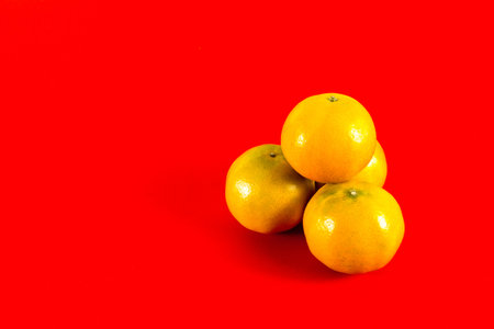Four oranges for chinese new year festivalの写真素材