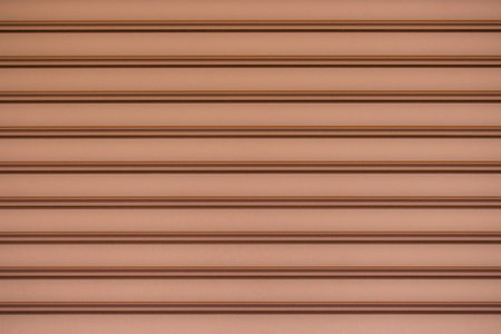 Texture of the metal gate with brown color.