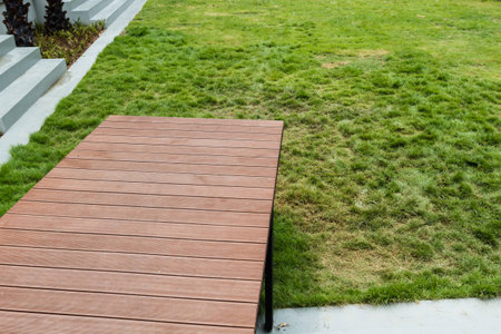 Wooden bridge is installed in the garden.の写真素材