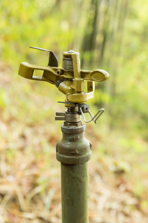 Metal sprinkler with blur backgroundの写真素材