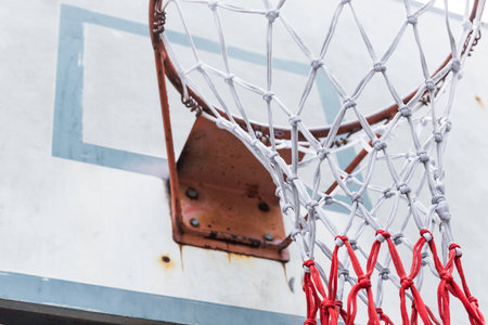Close up basketball hoop net with drity old boardの写真素材