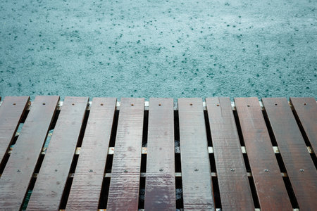 Raindrops and wood plankの写真素材