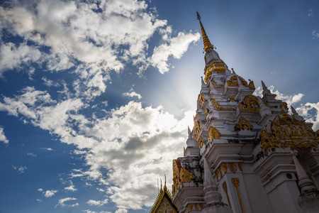 Surat Thani, Thailand - July 12, 2015 : Sunlight shine behide great pagoda at Chaiya Relic temple, Surat Thani, Thailand. This temple is famous in Surat Thani province.のeditorial素材