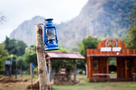 Some resort decorate their place in contry theme. They use old lantern, straw, well and backdrop that relate to cowboy style.の写真素材