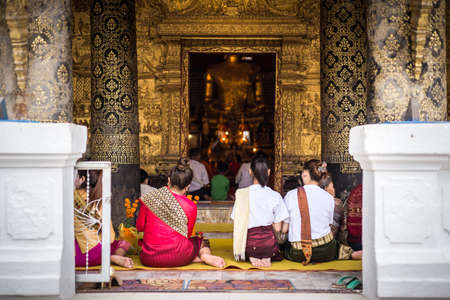 Luang Prabang, Laos - July 08, 2017: People in Luang Prabang, Lao are in the temple for worship.のeditorial素材