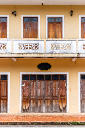 Architech of old townhome with wooden door