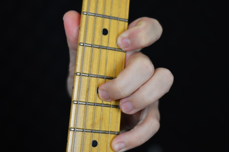 Hand Playing Guitar