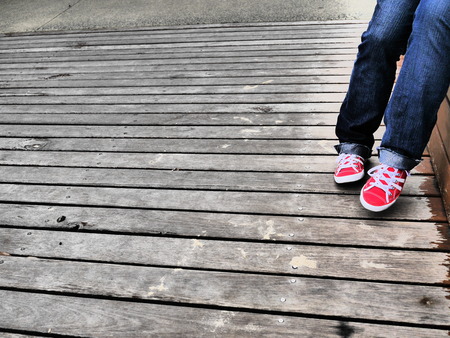 Female Legs With Red Shoes