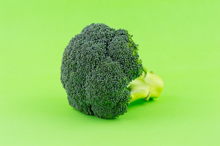 Broccoli on Green Background