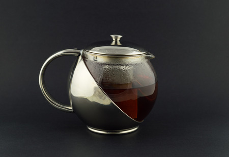 Tea Pot Dark Grey Backgroundの写真素材