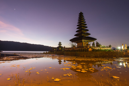 Pura Ulun Danu Hindu temple at morning with sunset  in Bali Indonesiaの写真素材