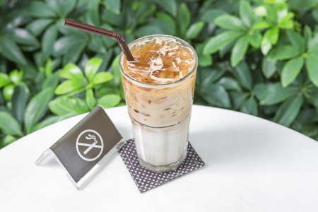 Ice latte coffee milk with espresso coffee on tableの写真素材