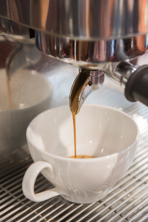 coffee machine making espresso in a cafeの写真素材