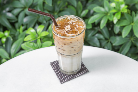 Ice latte coffee milk espresso on tableの写真素材