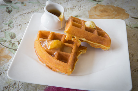 Waffle with caramel sweet in cafeの写真素材