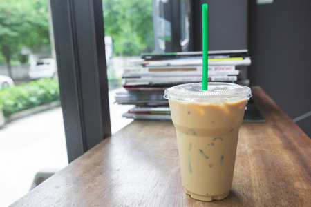 Ice coffee on wood tableの写真素材