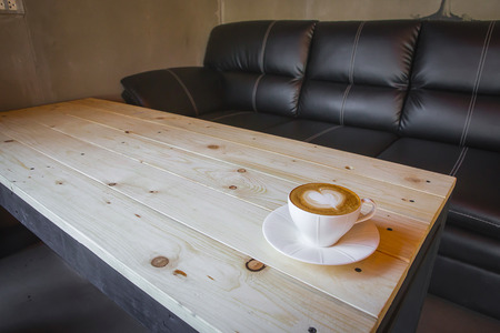 cup of coffee on table in cafeの写真素材