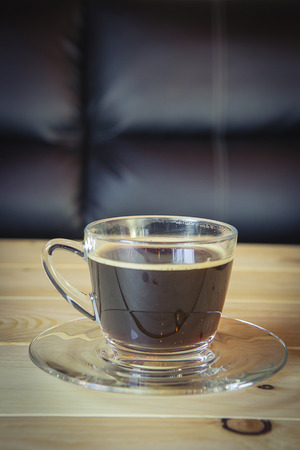 cup of coffee on table in cafeの写真素材