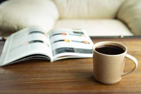 Coffee latte with a book in coffee shopの写真素材