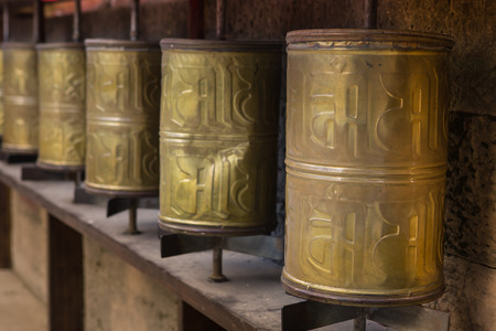 Holy wheel for prayer in Tibetan monasteryの写真素材