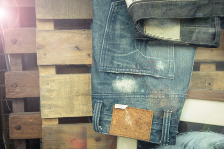 Jean decoration on wood plate , vintage picture styleの写真素材