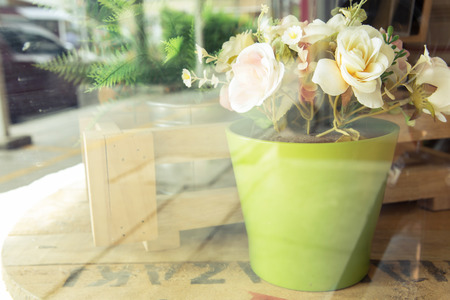 Decorative flower on desk vintage picture styleの写真素材