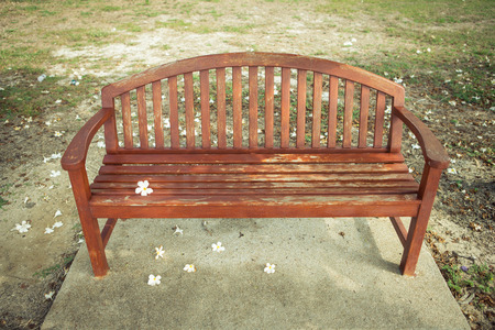 a chair with flower in garden , vintage style pictureの写真素材