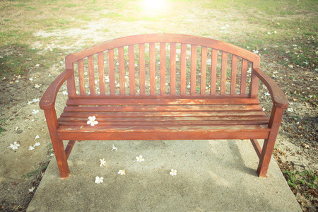 a chair with flower in garden , vintage style pictureの写真素材