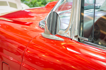 Mirror on an old classic carの写真素材
