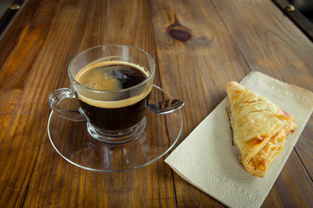 Cup of coffee on table in cafeの写真素材