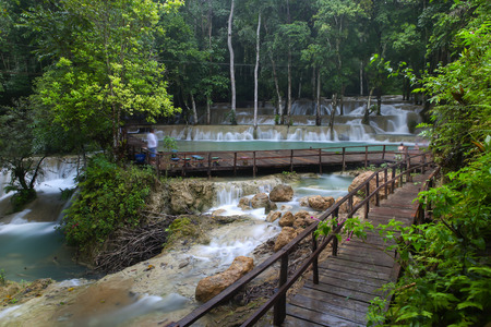 Wooden trails in Tad Sae waterfall , waterfall in deep forest at Lung Prabang , Laosの写真素材