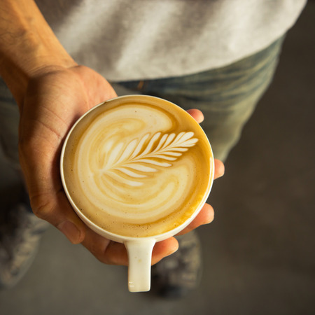 Cup of coffee latte art , vintage color toneの写真素材