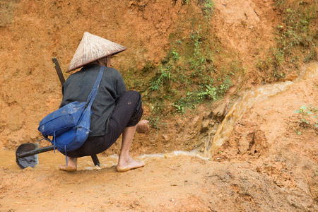 Farmer working on his farm, step farming, sapa Vietnamのeditorial素材