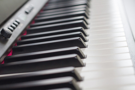 Selective focus piano keyboard with the light