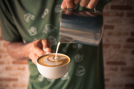 Selective focus coffee latte art make by baristaの写真素材