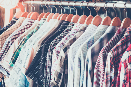 Vintage shirt on rack in marketの写真素材