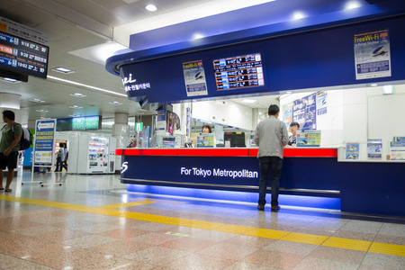 TOKYO-JAPAN-OCTOBER 8,2016; Traveler get ticket in Ticket office Skyline  (Railway) for jouney in Japan on Narita Airport, Tokyo Japanのeditorial素材