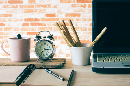 Close up accessories on table office in loft style officeの写真素材