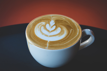 Hot latte coffee in cafeの写真素材