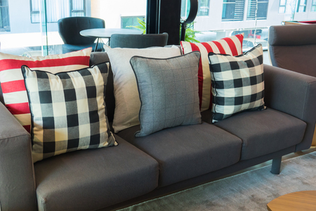 Set of pillows on luxuty sofa in living room, interior designの写真素材