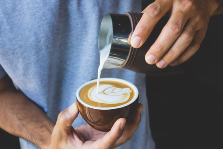 Coffee latte art by Baristaの写真素材
