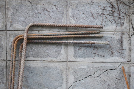 Steel Rebar with brick wall backgroundの写真素材