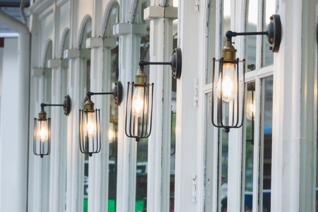Selective focus vintage lamp on restaurant wallの写真素材