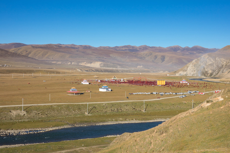 Tibetan monks pilgrims in Buddha festival in Yarchen Gar monastery  Baidu city  , Chinaの写真素材