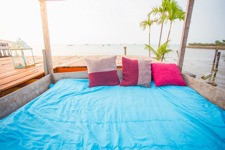 Colorful bed with pillow at beach of Thailandの写真素材