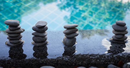 zen stones on pool ,relax and sapa conceptの写真素材