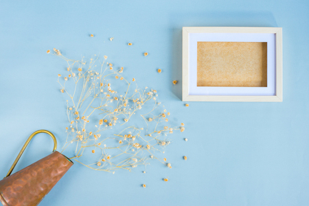 Top view of dried flower and twin white picture frame for your text  on pastel color background. Flat lay.の写真素材