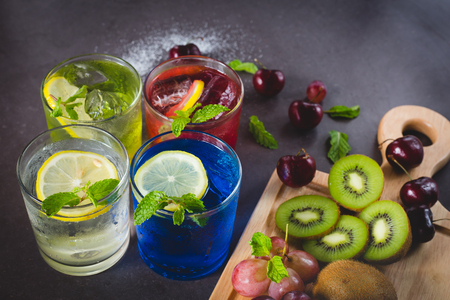 Fresh lemonade jar with summer fruits and berries.の写真素材