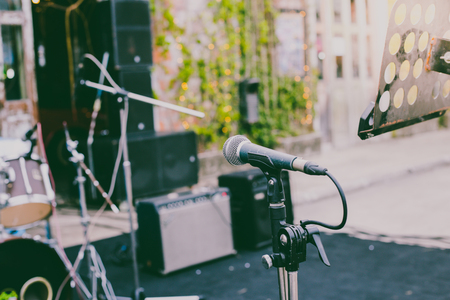 Microphone and music instrument on stage . vintage color toneの写真素材